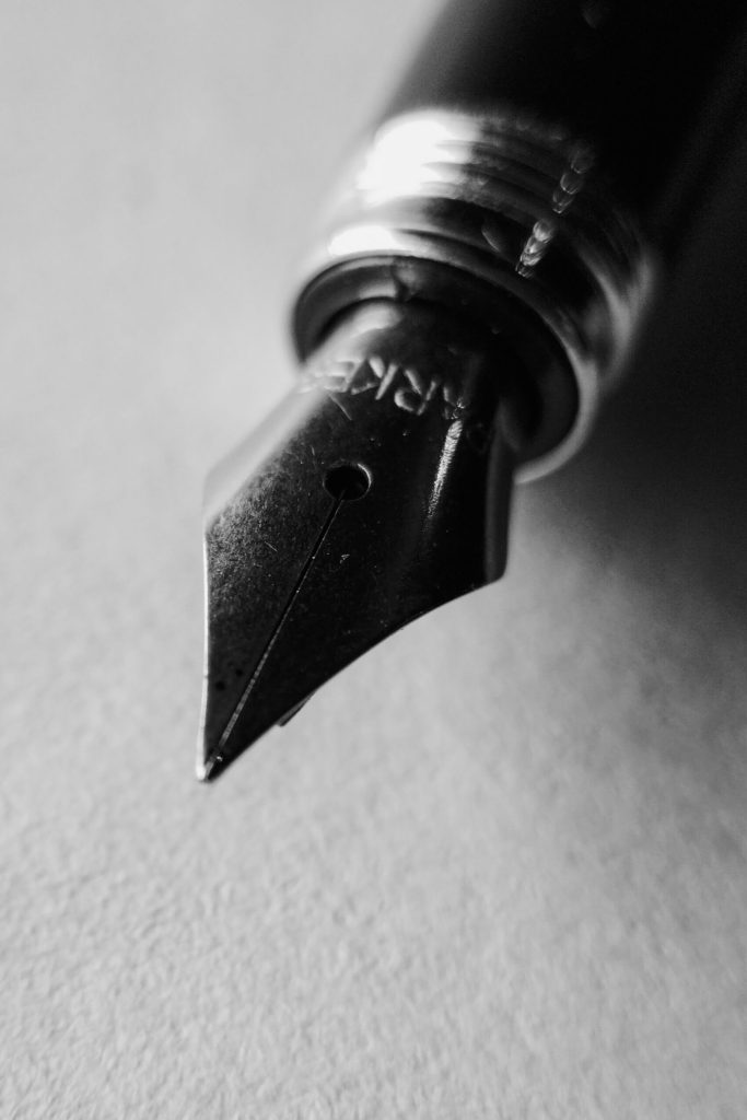 pexels photo 18031748 18031748 Elegant black and white close-up of a fountain pen nib, perfect for artistic and writing themes.